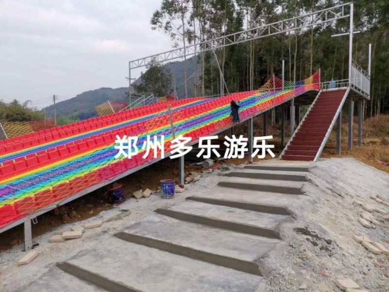 China Supply Outdoor Playground Plastic Dry Ski Rainbow Snow Slip Slide Fun Park Equipment for Amusement Park